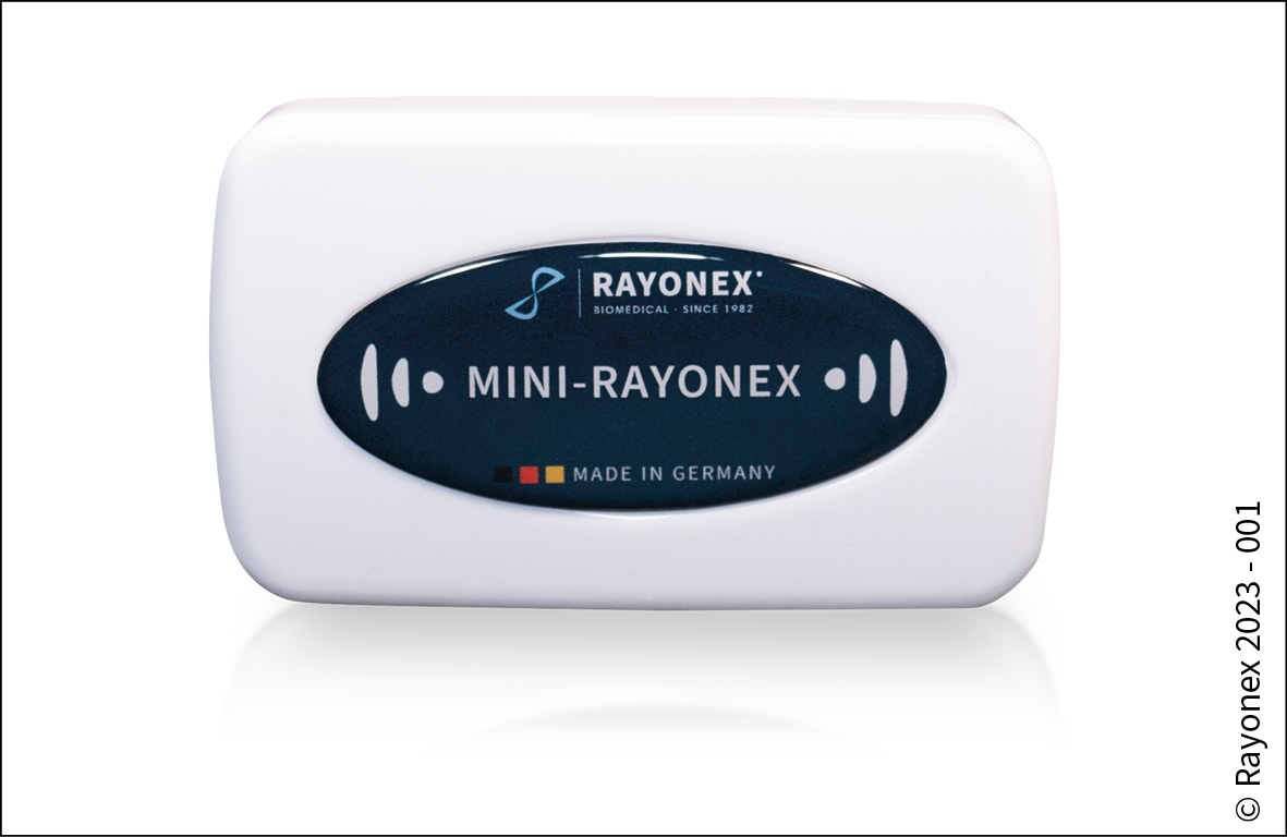Mini-Rayonex laite valkoisella tasolla